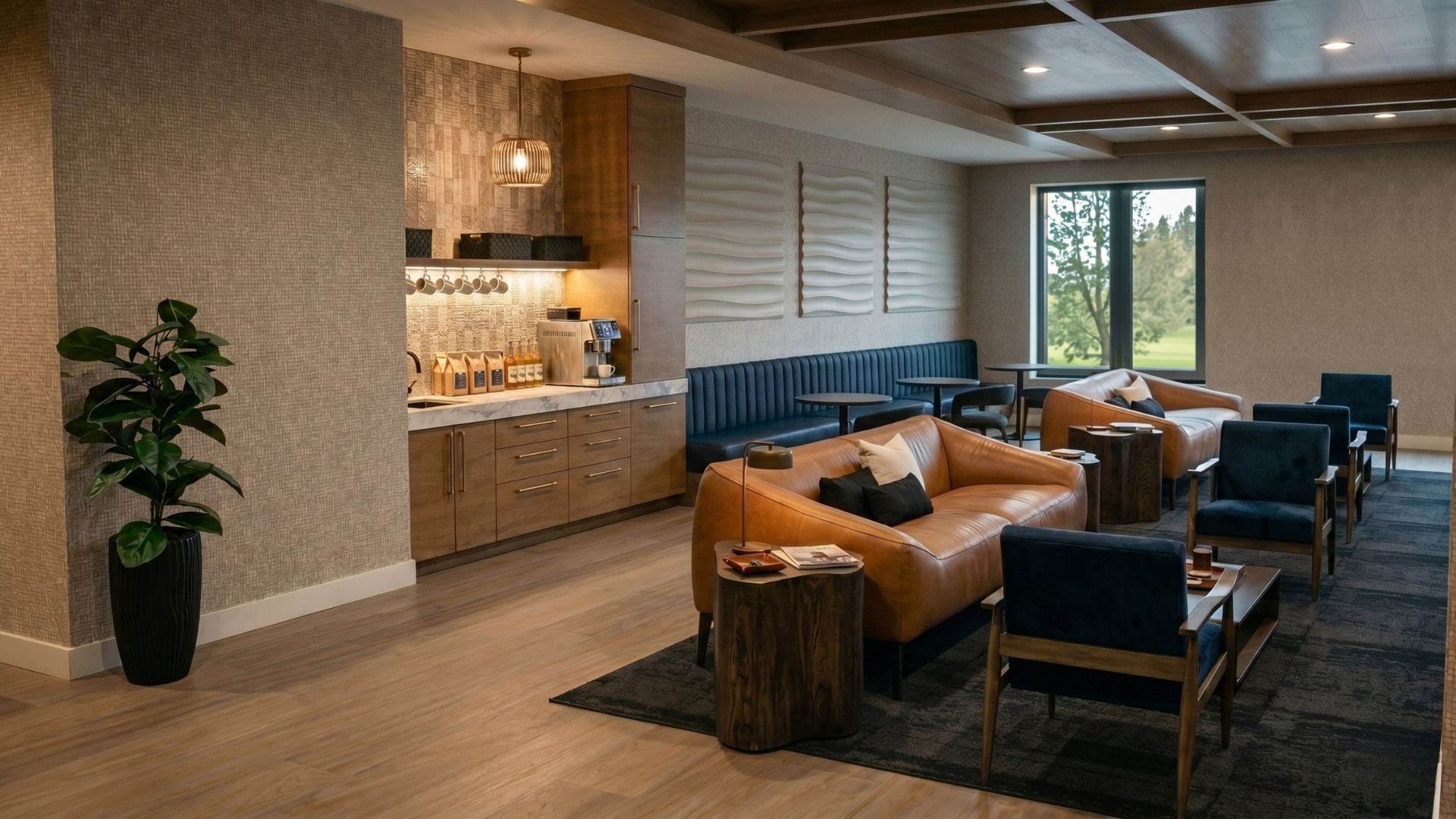 Resident lounge with coffee bar and golf course view