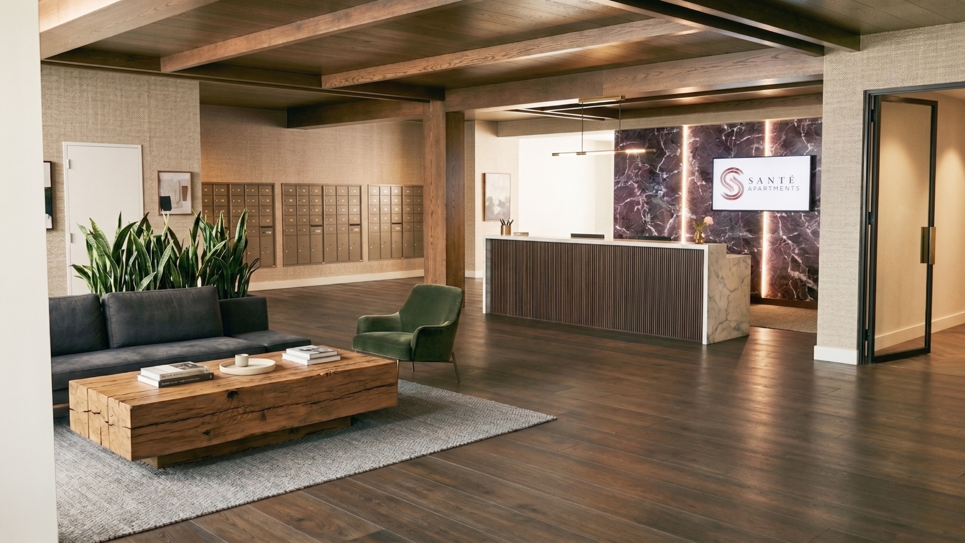 Santé Apartments — Grand lobby with concierge desk